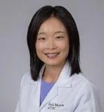 X. Mona Guo